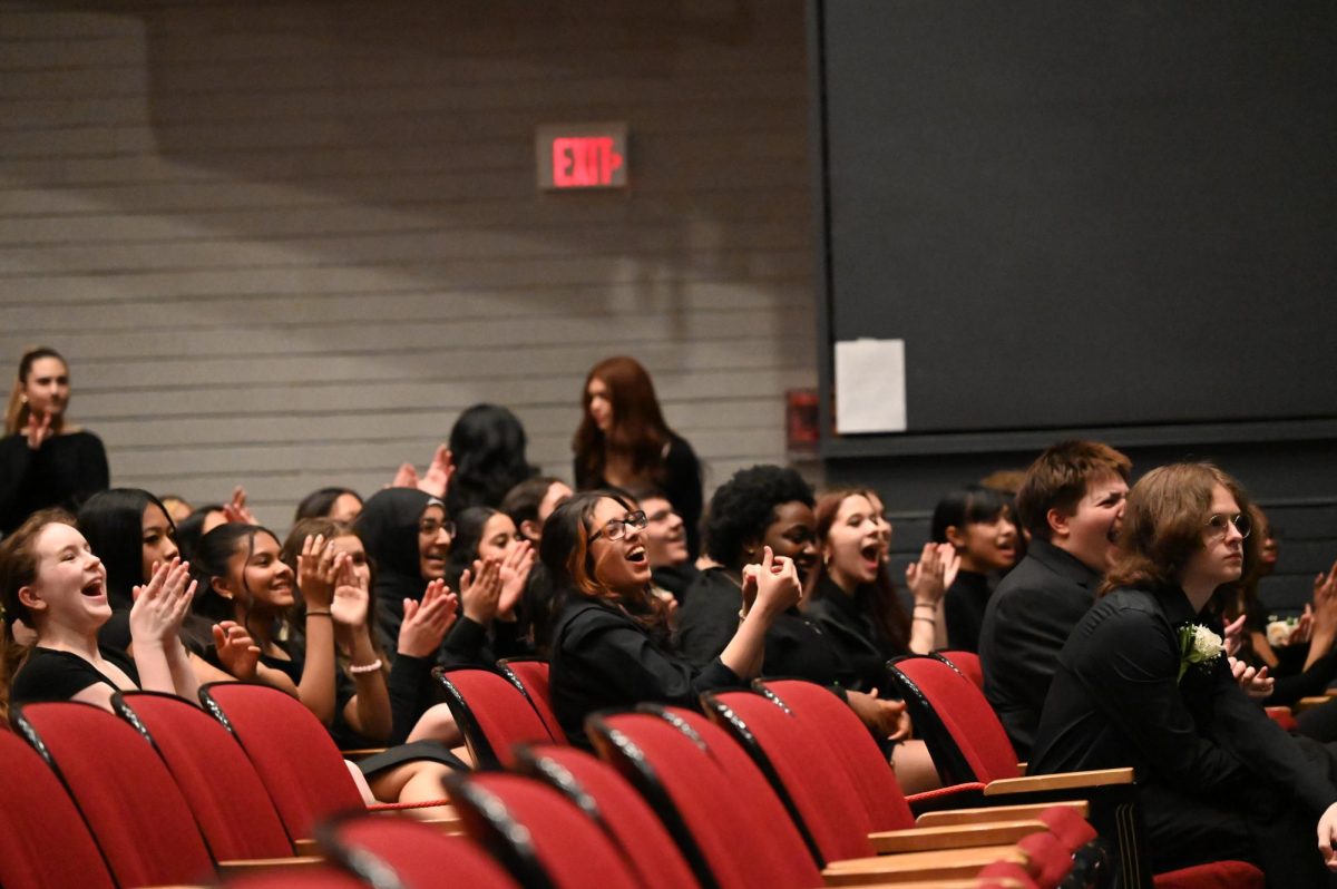 Non-rehearsing choir members applauding after Tonality’s “All I Wanted” performance during rehearsal.