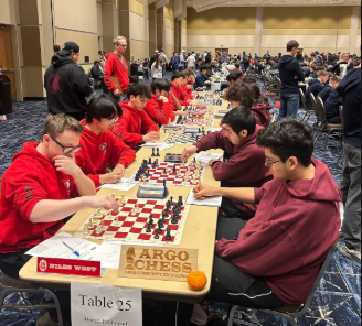 The chess team competes against Argo Community High School. Picture via Nathan Noparstak.