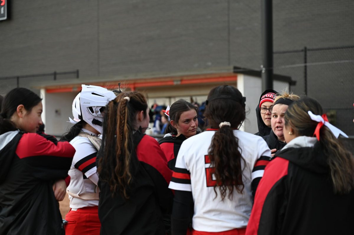 Coach Kelly Kleppin talks to the team during a timeout. "The season's going pretty well. We are thirteen games into the season. We are five and eight, so we are working our way up. We've really come together and it's exciting," Kleppin said. 