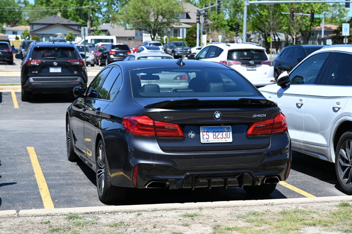This metallic black BMW 540i has the M-Sport package as well as an upgraded duckbill spoiler.